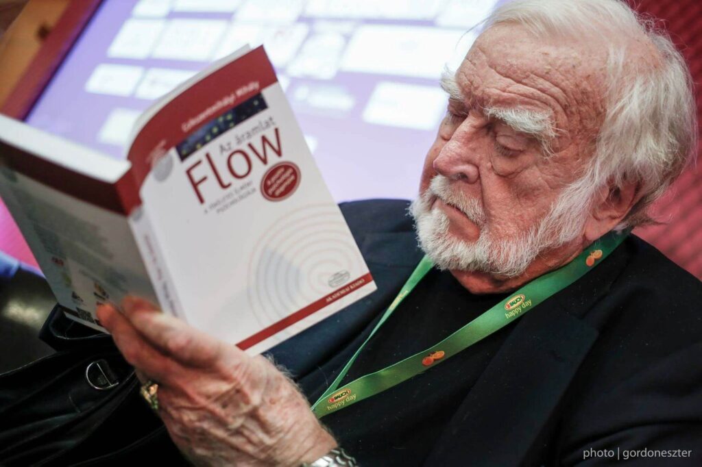 man reading book - Flow