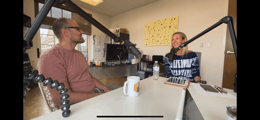 podcast guests being interviewed at mics