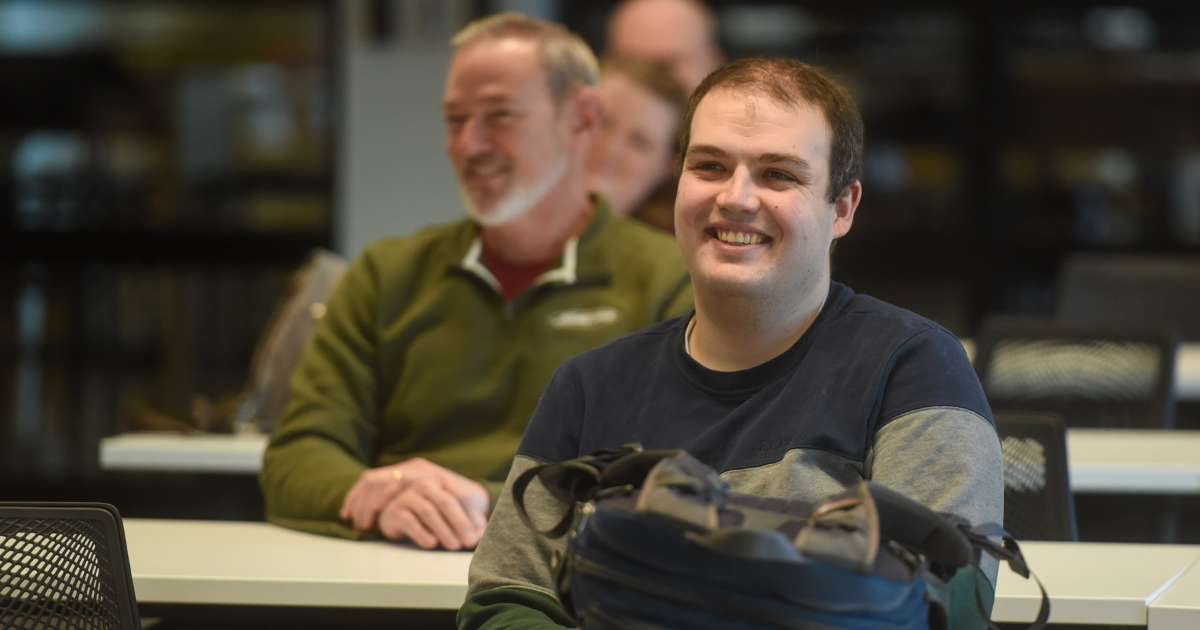 SEP Team smiling during presentation